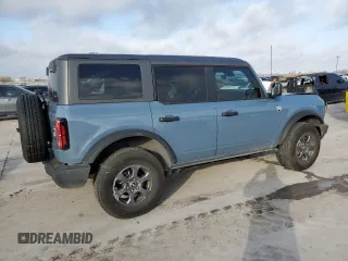 2024 Ford Bronco Big Bend z VIN 1FMDE7BH7RLA03788, wystawiony jako Copart lot #48574295 z przebiegiem 10 597 mil mil oraz Szkoda całkowita • Salvage title. Historia ofert i sprzedaży dostępna na DreamBid. Obrazek 3.