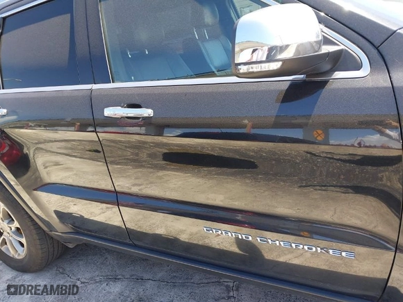 2015 Jeep Grand Cherokee Limited with VIN 1C4RJFBG4FC827251, listed as a IAAI auction lot 41930563 with 94,208 mi miles. Bid and sale history available at carsss.com. Image 13.