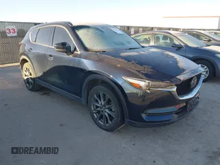 2019 Mazda CX-5 Signature with VIN JM3KFBEY5K0656965, listed as a IAAI auction lot 41421453 with 99,073 mi miles. Bid and sale history available at carsss.com. Image 6.