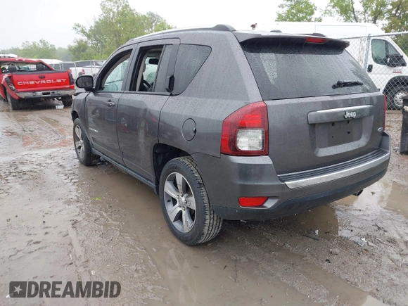 2016 Jeep Compass Latitude with VIN 1C4NJCEA2GD804809, listed as a IAAI auction lot 42329508 with 61,264 mi miles and . Bid and sale history available at DreamBid. Image 3.