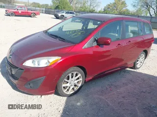 2012 Mazda 5 Touring with VIN JM1CW2CL3C0133076, listed as a IAAI auction lot 42121771 with 144,580 mi miles and . Bid and sale history available at DreamBid. Image 2.