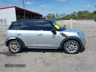 2015 MINI Countryman S z VIN WMWZC5C57FWP46371, wystawiony jako IAAI lot #42214115 z przebiegiem 87 234 mil mil oraz . Historia ofert i sprzedaży dostępna na DreamBid. Obrazek 13.