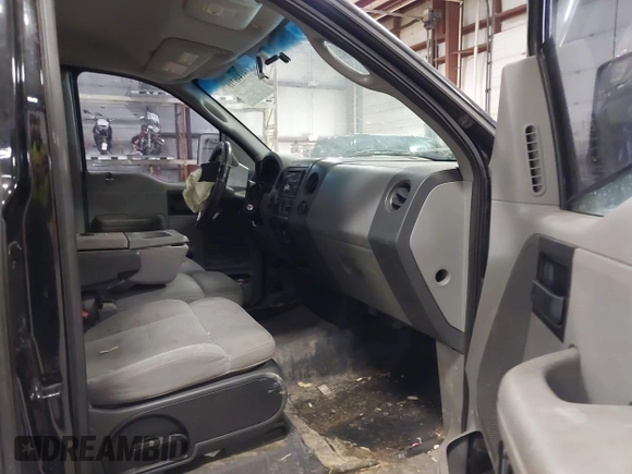 2005 Ford F-150 XL with VIN 1FTRF12265KE88523, listed as a IAAI auction lot 41446716 with 173,866 mi miles. Bid and sale history available at carsss.com. Image 5.