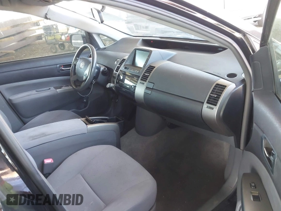2007 Toyota Prius with VIN JTDKB20U277597719, listed as a IAAI auction lot 42153731 with 148,174 mi miles and . Bid and sale history available at DreamBid. Image 5.