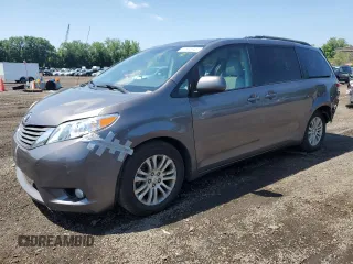 2011 Toyota Sienna XLE AAS with VIN 5TDYK3DC7BS046668, listed as a Copart auction lot 61594645 with 231,694 mi miles and Salvage title. Bid and sale history available at DreamBid. Image 1.