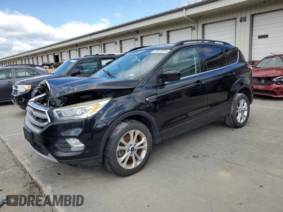 2017 Ford Escape SE z VIN 1FMCU0G93HUF10560, wystawiony jako Copart lot #57973915 z przebiegiem 127 444 mil mil oraz Czysty tytuł • Clean title. Historia ofert i sprzedaży dostępna na DreamBid. Obrazek 1.