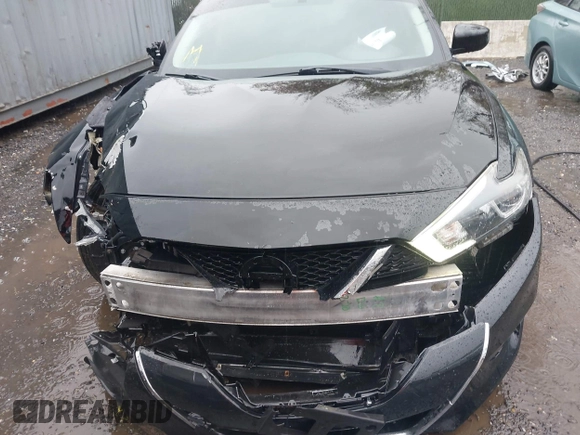 2018 Nissan Maxima S with VIN 1N4AA6AP8JC361269, listed as a IAAI auction lot 42005790 with 110,580 mi miles and . Bid and sale history available at DreamBid. Image 12.