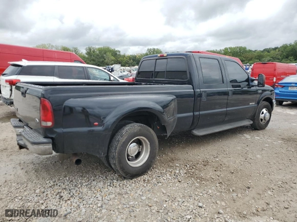2003 Ford Super Duty F-350 DRW XL with VIN 1FTWW32P73EB62302, listed as a Copart auction lot 69620474 with 323,713 mi miles and Clean Title. Bid and sale history available at carsss.com. Image 3.