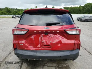 2021 Ford Escape SE with VIN 1FMCU0G67MUA28996, listed as a Copart auction lot 60305015 with 64,013 mi miles and Salvage title. Bid and sale history available at DreamBid. Image 6.