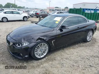 2014 BMW 4 Series 435i with VIN WBA3T3C50EJ876997, listed as a IAAI auction lot 42406299 with 115,048 mi miles and . Bid and sale history available at DreamBid. Image 17.