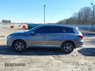 2016 Infiniti QX60 with VIN 5N1AL0MM0GC524715, listed as a IAAI auction lot 41215072 with 145,633 mi miles and . Bid and sale history available at DreamBid. Image 14.