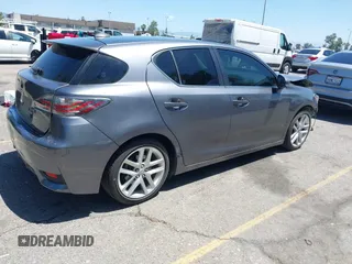 2015 Lexus CT 200h with VIN JTHKD5BH9F2215210, listed as a IAAI auction lot 42266502 with 229,754 mi miles and . Bid and sale history available at DreamBid. Image 4.