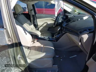 2014 Ford Escape Titanium with VIN 1FMCU9J96EUA15990, listed as a IAAI auction lot 41667046 with 203,202 mi miles. Bid and sale history available at carsss.com. Image 5.