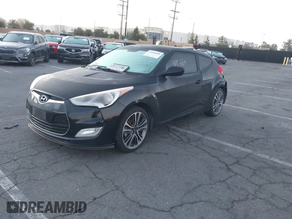 2016 Hyundai Veloster z VIN KMHTC6AD8GU251095, wystawiony jako IAAI lot #41598280 z przebiegiem 119 099 mil mil oraz . Historia ofert i sprzedaży dostępna na DreamBid. Obrazek 2.