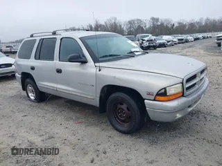 1999 Dodge Durango with VIN 1B4HR28YXXF517034, listed as a IAAI auction lot 41556485 with 208,998 mi miles and . Bid and sale history available at DreamBid. Image 1.