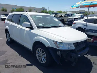 2017 Dodge Journey SXT z VIN 3C4PDCBGXHT515715, wystawiony jako IAAI lot #42391417 z przebiegiem 157 015 mil mil oraz . Historia ofert i sprzedaży dostępna na DreamBid. Obrazek 1.