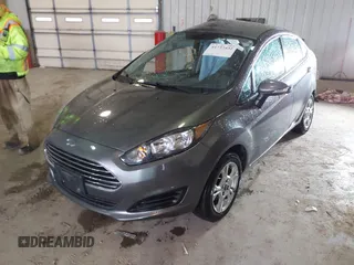 2014 Ford Fiesta SE with VIN 3FADP4BJ9EM117175, listed as a IAAI auction lot 41737432 with 156,141 mi miles. Bid and sale history available at carsss.com. Image 2.