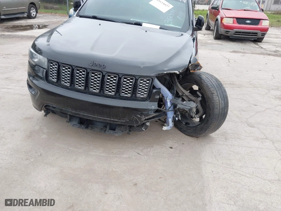 2018 Jeep Grand Cherokee Laredo E with VIN 1C4RJFAG7JC312948, listed as a IAAI auction lot 41624027 with 116,763 mi miles. Bid and sale history available at carsss.com. Image 6.