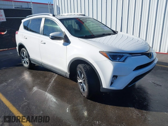 2018 Toyota RAV4 XLE with VIN JTMWFREV7JJ743297, listed as a IAAI auction lot 41579019 with 102,442 mi miles. Bid and sale history available at carsss.com. Image 1.