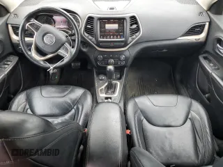 2014 Jeep Cherokee Limited z VIN 1C4PJMDB8EW243493, wystawiony jako Copart lot #53293485 z przebiegiem 210 910 mil mil oraz Czysty tytuł • Clean title. Historia ofert i sprzedaży dostępna na DreamBid. Obrazek 8.