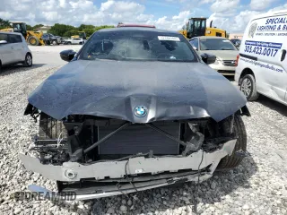 2024 BMW i5 M60 with VIN WBY43FK00RCR71826, listed as a Copart auction lot 72140144 with 5,987 mi miles and Salvage Title. Bid and sale history available at carsss.com. Image 5.