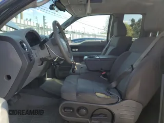 2005 Ford F-150 XLT with VIN 1FTPX14595NA25303, listed as a Copart auction lot 50960805 with 223,385 mi miles and Salvage Title. Bid and sale history available at carsss.com. Image 7.