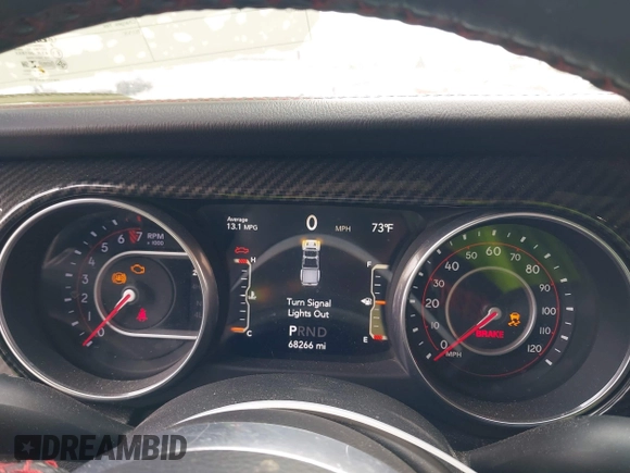 2020 Jeep Gladiator Rubicon z VIN 1C6JJTBG7LL102189, wystawiony jako IAAI lot #42320968 z przebiegiem 68 266 mil mil oraz . Historia ofert i sprzedaży dostępna na DreamBid. Obrazek 7.