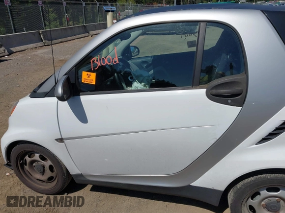 2012 Smart fortwo Pure z VIN WMEEJ3BAXCK563660, wystawiony jako IAAI lot #42165195 z przebiegiem 53 809 mil mil oraz . Historia ofert i sprzedaży dostępna na DreamBid. Obrazek 15.