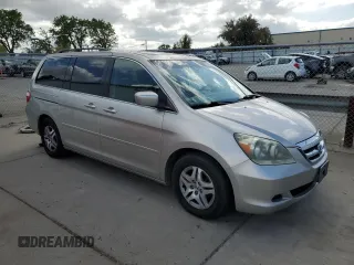 2005 Honda Odyssey EX-L z VIN 5FNRL38655B408107, wystawiony jako Copart lot #50918155 z przebiegiem 215 920 mil mil oraz Szkoda całkowita • Salvage title. Historia ofert i sprzedaży dostępna na DreamBid. Obrazek 4.