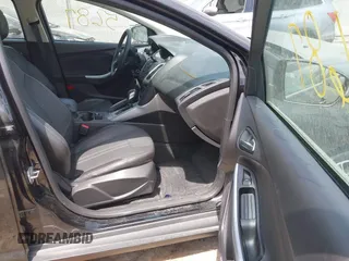 2014 Ford Focus SE z VIN 1FADP3K20EL173638, wystawiony jako IAAI lot #42265687 z przebiegiem 41 792 mil mil oraz . Historia ofert i sprzedaży dostępna na DreamBid. Obrazek 5.