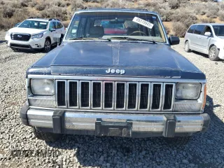 1987 Jeep Cherokee with VIN 1JCMT7842HT114597, listed as a Copart auction lot 49319945 with 230,675 mi miles and Clean title. Bid and sale history available at DreamBid. Image 5.
