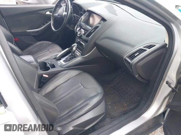 2012 Ford Focus Titanium с VIN 1FAHP3J28CL381248, выставлен на аукционе IAAI как лот 39731691 с пробегом 123 720 миль миль и . История ставок и продаж доступна на DreamBid. Изображение 5.