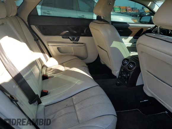2014 Jaguar XJ with VIN SAJWA2GZ9E8V71794, listed as a Copart auction lot 74347574 with 106,172 mi miles and Clean Title. Bid and sale history available at carsss.com. Image 10.