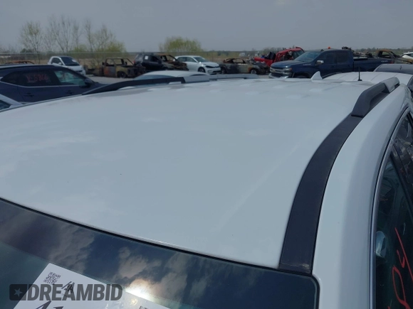 2018 Chevrolet Traverse LT z VIN 1GNEVHKW3JJ125861, wystawiony jako IAAI lot #41876184 z przebiegiem 95 223 mil mil oraz . Historia ofert i sprzedaży dostępna na DreamBid. Obrazek 19.