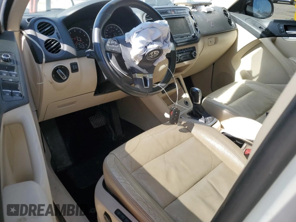 2012 Volkswagen Tiguan SEL with VIN WVGAV7AX9CW530331, listed as a Copart auction lot 50129405 with 141,387 mi miles and Salvage Title. Bid and sale history available at DreamBid. Image 8.