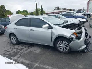 2019 Toyota Corolla L with VIN 5YFBURHE4KP929909, listed as a IAAI auction lot 42078797 with 131,741 mi miles. Bid and sale history available at carsss.com. Image 14.