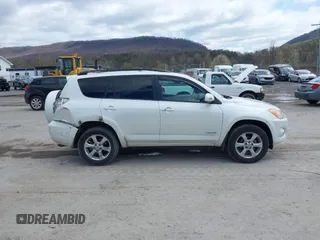 2010 Toyota RAV4 Limited with VIN JTMDF4DV3A5023063, listed as a IAAI auction lot 41983738 with 163,059 mi miles and . Bid and sale history available at DreamBid. Image 14.