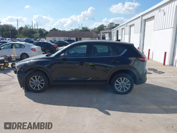 2023 Mazda CX-5 2.5 S with VIN JM3KFBAM3P0104813, listed as a IAAI auction lot 41540923 with 30,861 mi miles. Bid and sale history available at carsss.com. Image 15.