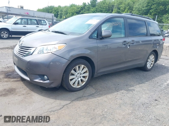 2011 Toyota Sienna XLE with VIN 5TDDK3DC8BS028176, listed as a IAAI auction lot 42592654 with 161,992 mi miles and . Bid and sale history available at DreamBid. Image 2.
