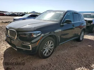 2020 BMW X5 xDrive40i with VIN 5UXCR6C06L9B05497, listed as a Copart auction lot 52110355 with 56,981 mi miles and Salvage Title. Bid and sale history available at carsss.com. Image 1.