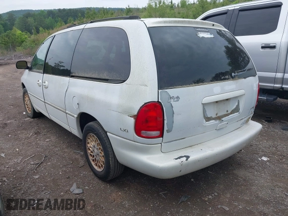 1998 Chrysler Town & Country LXi with VIN 1C4GP64L9WB664179, listed as a IAAI auction lot 42041600 with Not Provided miles. Bid and sale history available at carsss.com. Image 3.