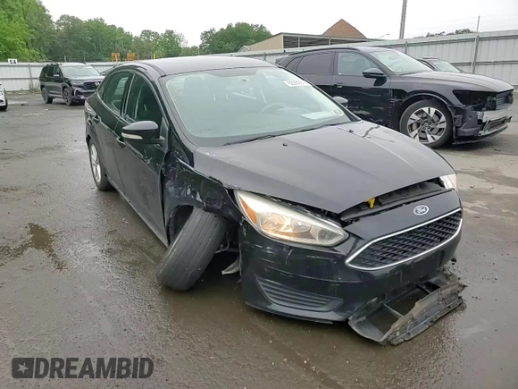 2016 Ford Focus SE z VIN 1FADP3F26GL340954, wystawiony jako Copart lot #60989915 z przebiegiem 26 052 mil mil oraz Szkoda całkowita • Salvage title. Historia ofert i sprzedaży dostępna na DreamBid. Obrazek 13.