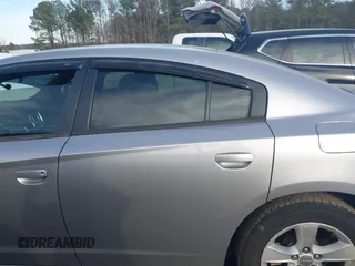 2014 Dodge Charger SE with VIN 2C3CDXBG5EH251804, listed as a IAAI auction lot 41659780 with 207,956 mi miles. Bid and sale history available at carsss.com. Image 14.