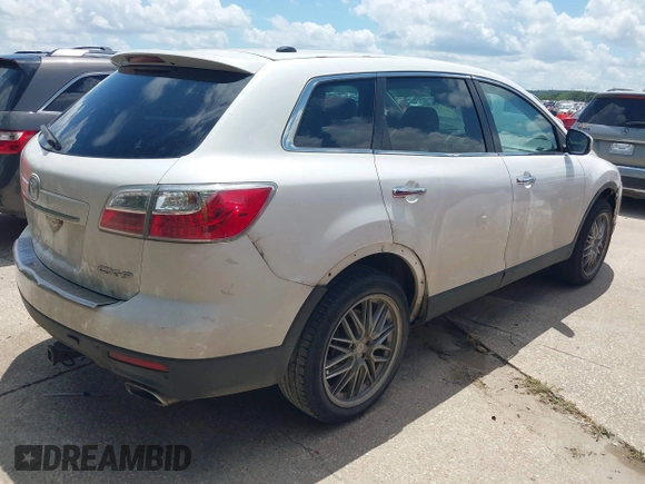 2010 Mazda CX-9 Grand Touring with VIN JM3TB2MA2A0206516, listed as a IAAI auction lot 42599987 with 199,229 mi miles and . Bid and sale history available at DreamBid. Image 4.