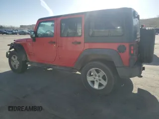 2015 Jeep Wrangler Unlimited Willys Wheeler with VIN 1C4BJWDG8FL574014, listed as a Copart auction lot 51921255 with 54,134 mi miles and Salvage Title. Bid and sale history available at DreamBid. Image 2.