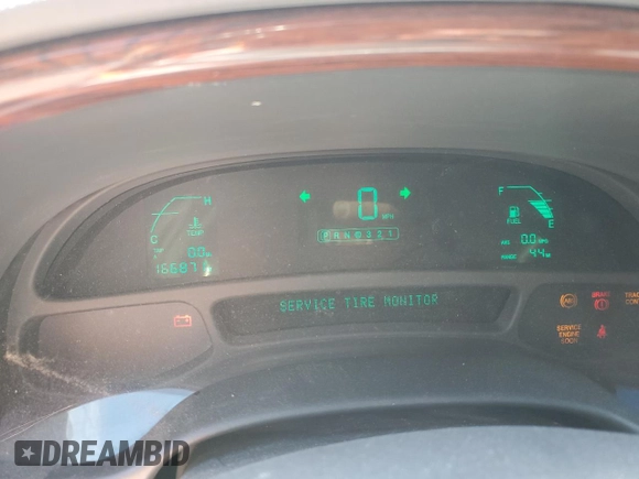 2005 Cadillac DeVille z VIN 1G6KD54Y65U100231, wystawiony jako Copart lot #55758605 z przebiegiem 166 871 mil mil oraz Szkoda całkowita • Salvage title. Historia ofert i sprzedaży dostępna na DreamBid. Obrazek 9.