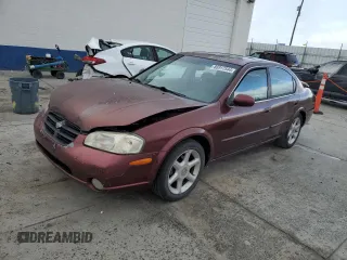 2001 Nissan Maxima GXE z VIN JN1CA31D51T827024, wystawiony jako Copart lot #86917544 z przebiegiem 179 756 mil mil oraz Szkoda całkowita • Salvage title. Historia ofert i sprzedaży dostępna na DreamBid. Obrazek 1.