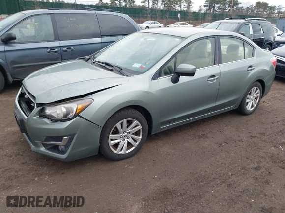2015 Subaru Impreza Premium z VIN JF1GJAC65FH019578, wystawiony jako IAAI lot #41675318 z przebiegiem 74 769 mil mil oraz . Historia ofert i sprzedaży dostępna na DreamBid. Obrazek 17.