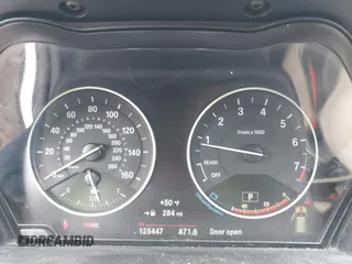 2018 BMW X1 xDrive28i with VIN WBXHT3C34J5K31430, listed as a IAAI auction lot 41954792 with 125,447 mi miles. Bid and sale history available at carsss.com. Image 7.