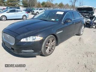 2013 Jaguar XJ Portfolio with VIN SAJWJ2GDXD8V55879, listed as a IAAI auction lot 41568366 with 121,119 mi miles and . Bid and sale history available at DreamBid. Image 17.